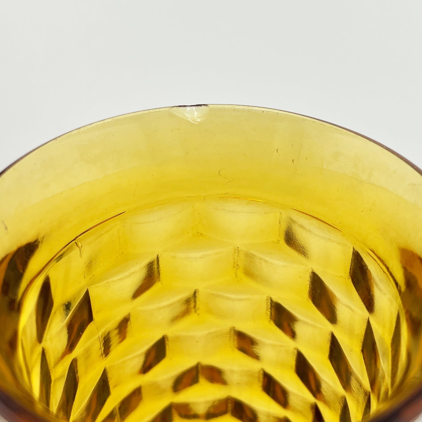 Set of Four Mid-Century Orange Amber Glass Goblets in Textured Honeycomb Pattern